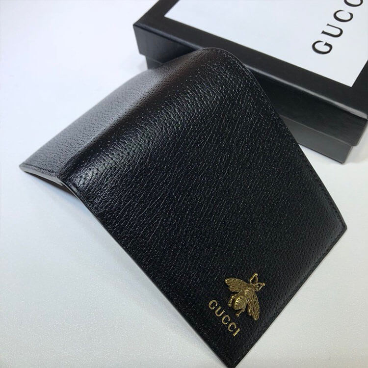 G*u*i animalier leather wallet