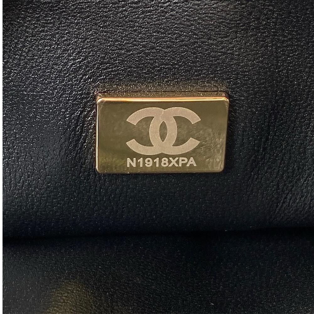 Ch*el mini flap with top handle