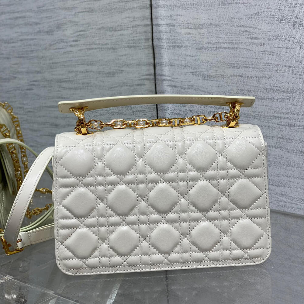D*or small D*or jolie top handle bag