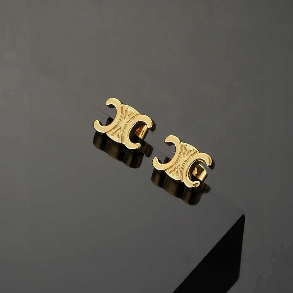 Ce**e triomphe studs in brass with gold finish