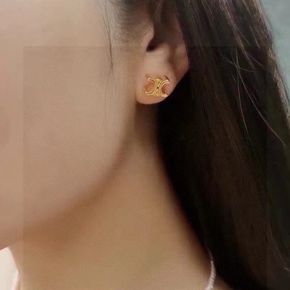 Ce**e triomphe studs in brass with gold finish