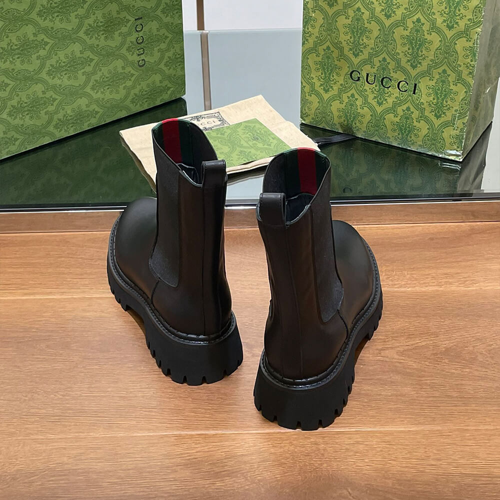 G*u*i women’s boot with web