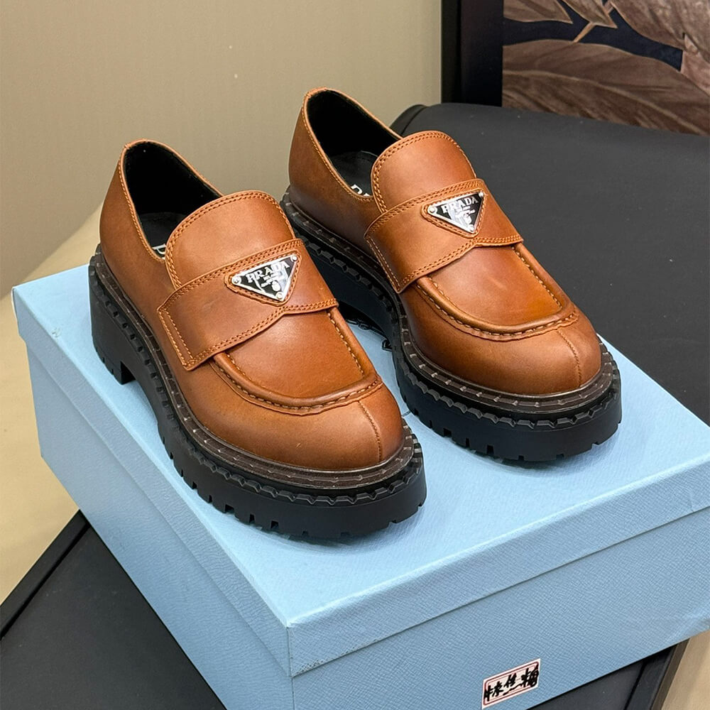 Pra*a double chocolate leather loafers