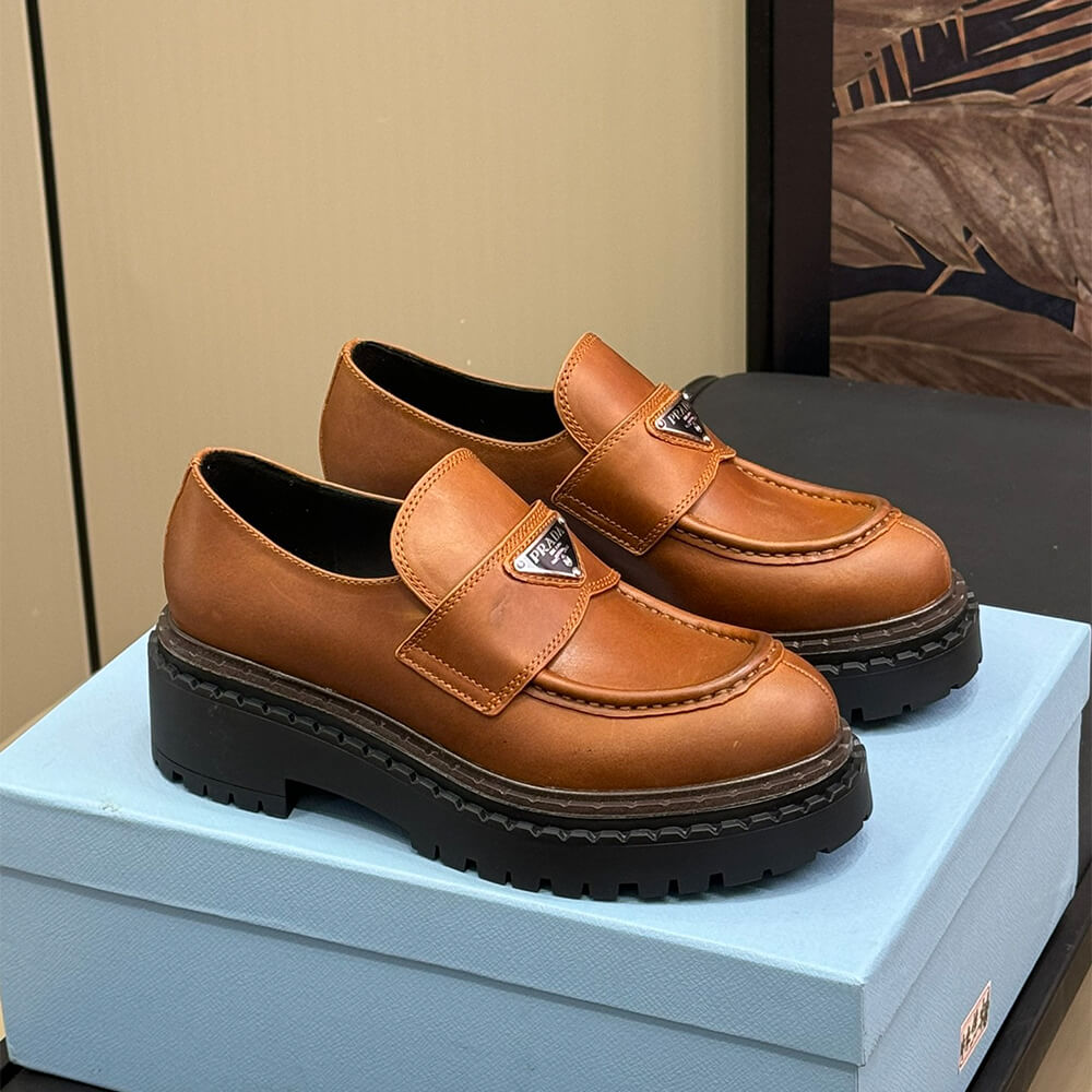 Pra*a double chocolate leather loafers