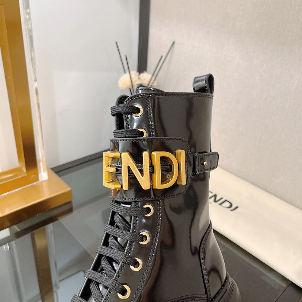 F**di F**digraphy logo-plaque leather boots