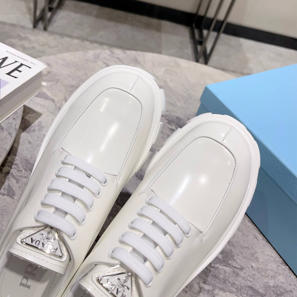 Pra*a monolith brushed leather lace-up shoes