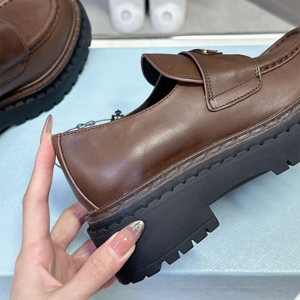 Pra*a double chocolate leather loafers