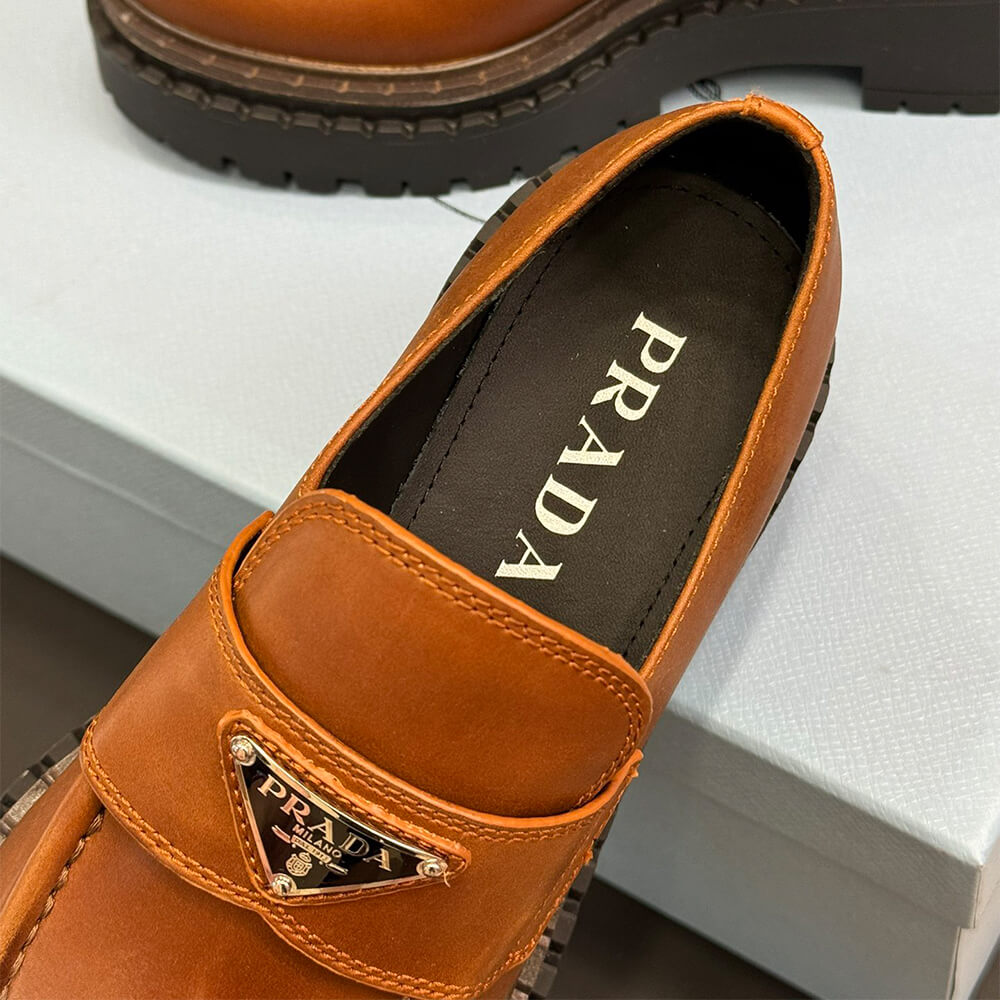 Pra*a double chocolate leather loafers